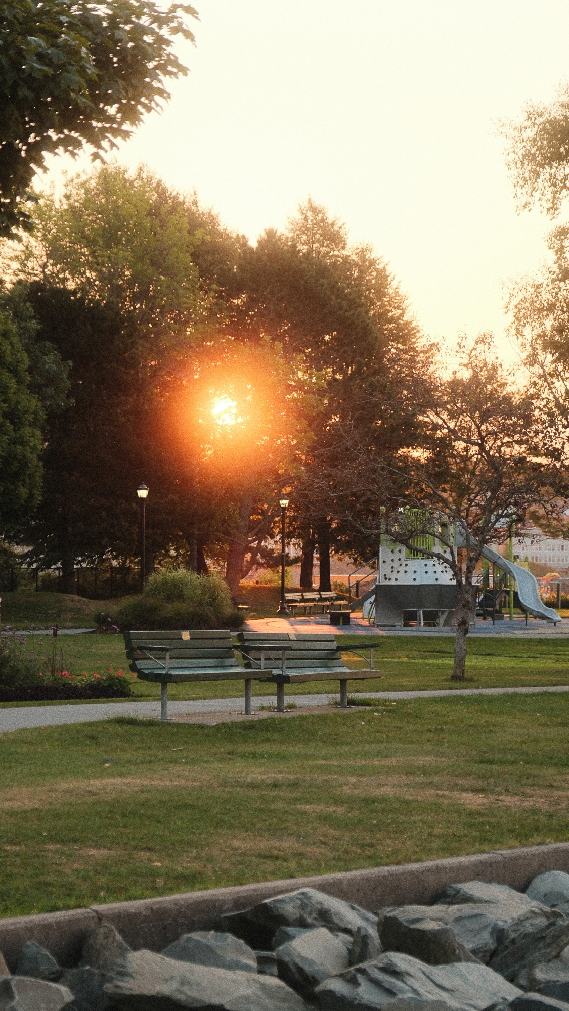 Dartmouth Ferry Park at sunrise with park bench